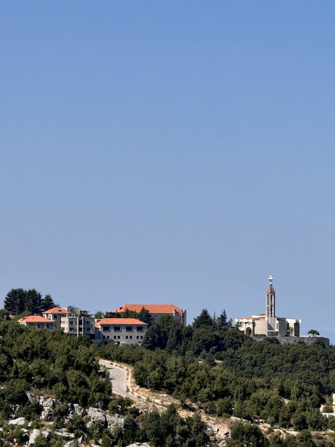 The monastery of Saint Charbel at Annaya, seen across the valley from the farm