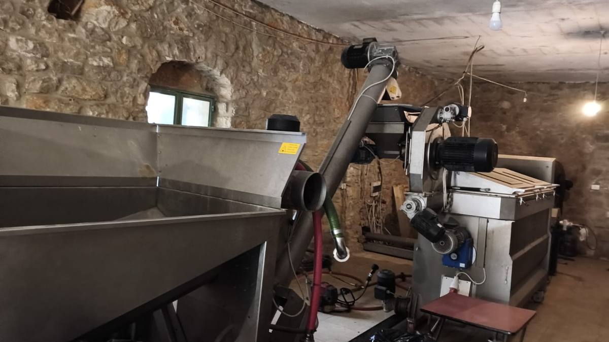 The two-phase line of the Ardouna olive mill inside the stone house at Mechmech